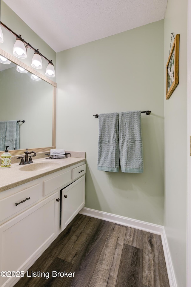 11208 Hasbrook Ct, Louisville, KY 40229 - bathroom featuring vanity and wood finished floors