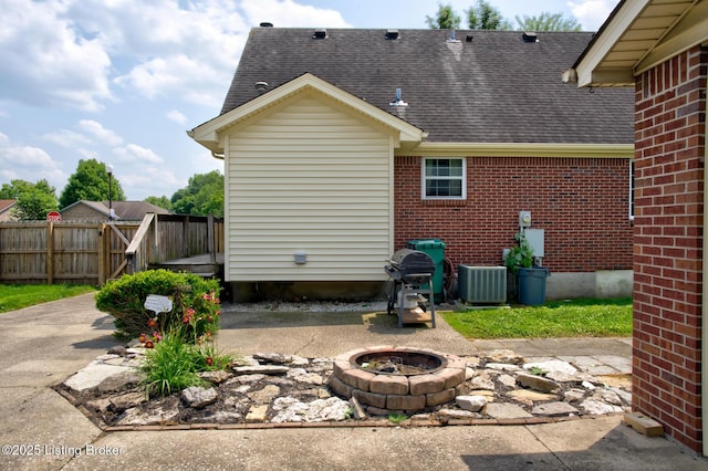 11208 Hasbrook Ct, Louisville, KY 40229 - view of patio / terrace featuring an outdoor fire pit