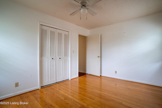 7906 Brynwood Ct, Louisville, KY 40291 - unfurnished bedroom featuring light wood-style floors, a closet, and a ceiling fan