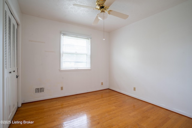 7906 Brynwood Ct, Louisville, KY 40291 - unfurnished bedroom featuring light wood-style floors, a closet, and ceiling fan