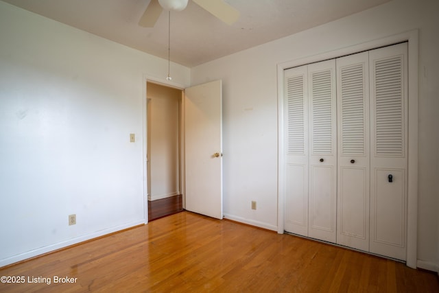 7906 Brynwood Ct, Louisville, KY 40291 - unfurnished bedroom with light wood finished floors, a closet, and ceiling fan