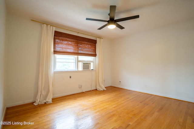 7906 Brynwood Ct, Louisville, KY 40291 - empty room with light wood-style flooring, a ceiling fan, and cooling unit