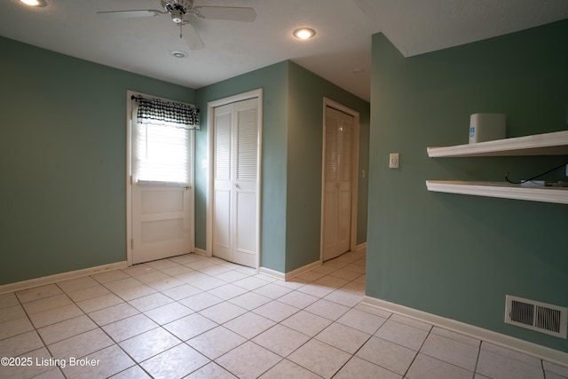 7906 Brynwood Ct, Louisville, KY 40291 - empty room with a ceiling fan, light tile patterned floors, and recessed lighting