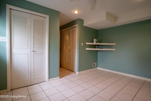 7906 Brynwood Ct, Louisville, KY 40291 - unfurnished bedroom with light tile patterned flooring, recessed lighting, and a ceiling fan