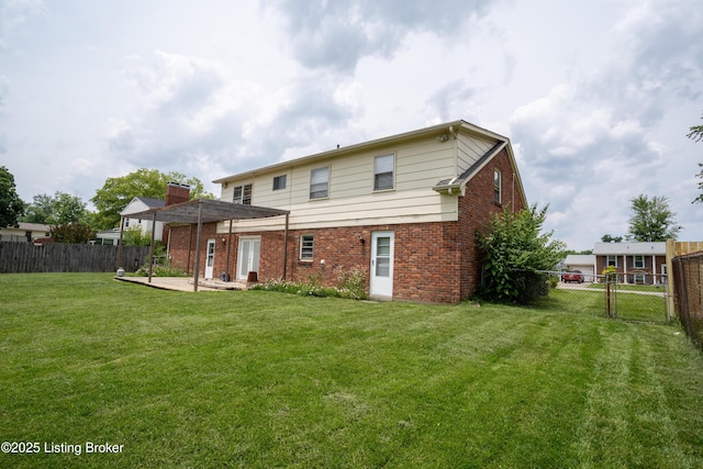 7906 Brynwood Ct, Louisville, KY 40291 - rear view of house with brick siding, a fenced backyard, a patio, and a gate
