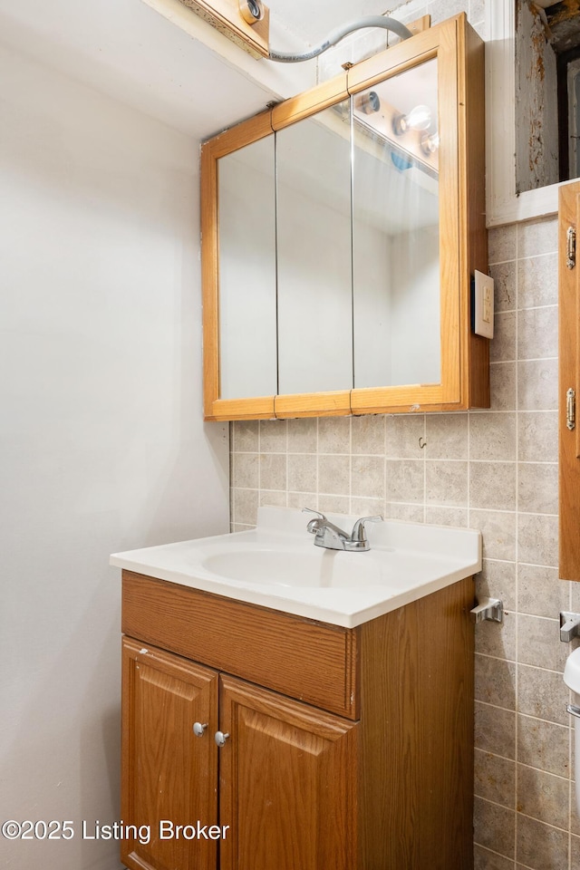 1833 Farnsley Rd, Louisville, KY 40216 - bathroom featuring vanity and backsplash