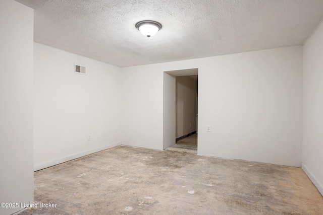 1833 Farnsley Rd, Louisville, KY 40216 - unfurnished room featuring concrete flooring and a textured ceiling