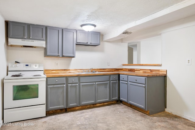 1833 Farnsley Rd, Louisville, KY 40216 - kitchen featuring electric stove, under cabinet range hood, gray cabinetry, butcher block countertops, and a textured ceiling