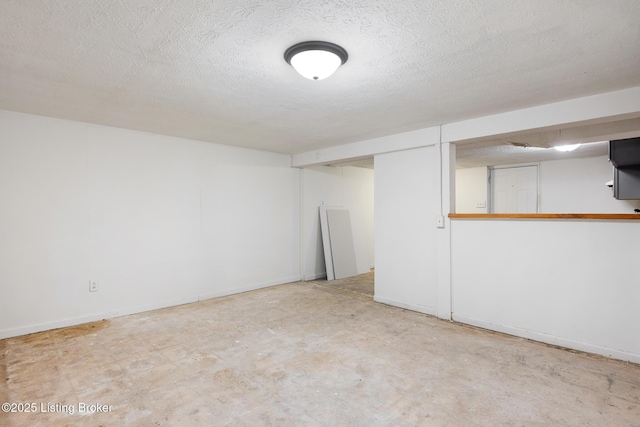1833 Farnsley Rd, Louisville, KY 40216 - finished basement featuring a textured ceiling and baseboards