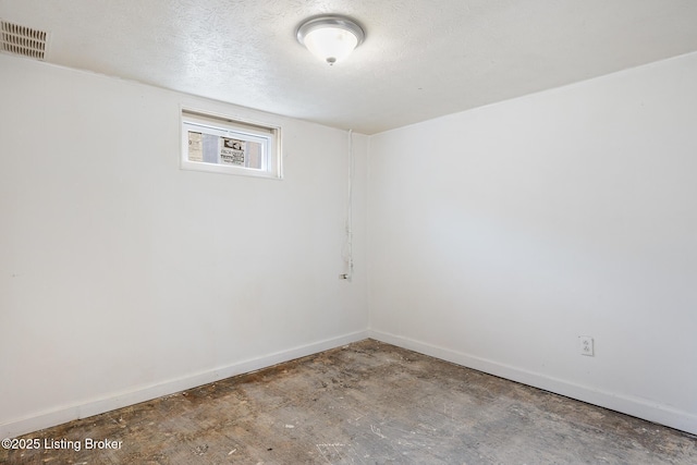 1833 Farnsley Rd, Louisville, KY 40216 - unfurnished room with baseboards and a textured ceiling