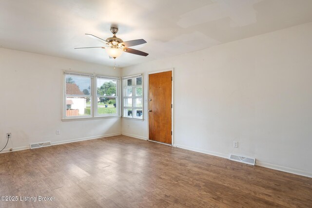 1833 Farnsley Rd, Louisville, KY 40216 - unfurnished room with a ceiling fan and wood finished floors