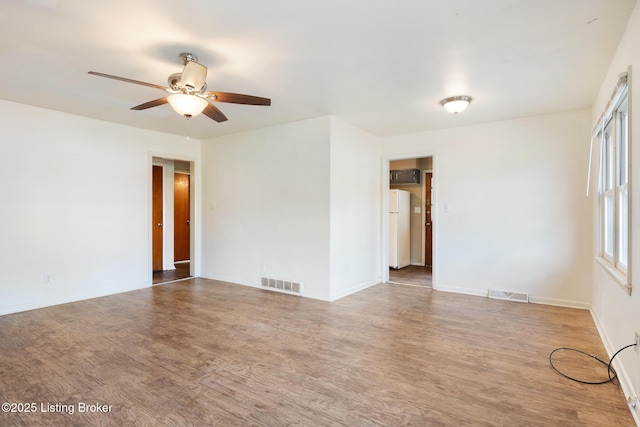 1833 Farnsley Rd, Louisville, KY 40216 - unfurnished room with wood finished floors and ceiling fan