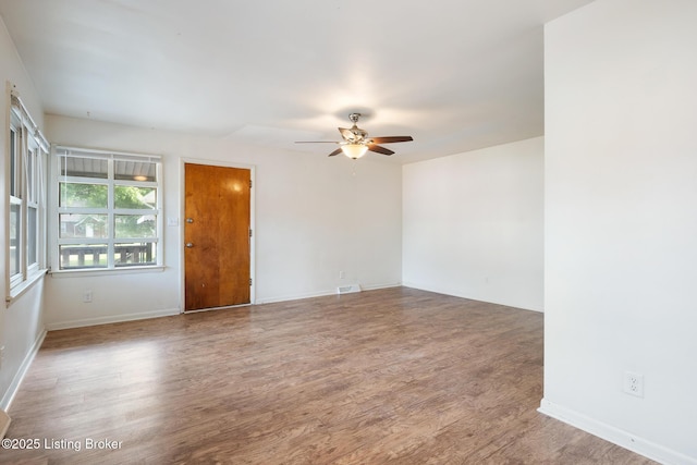 1833 Farnsley Rd, Louisville, KY 40216 - empty room featuring ceiling fan and wood finished floors