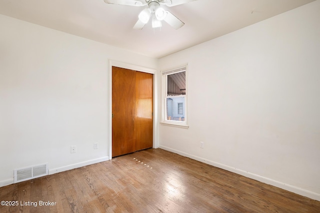 1833 Farnsley Rd, Louisville, KY 40216 - unfurnished room with wood finished floors and ceiling fan