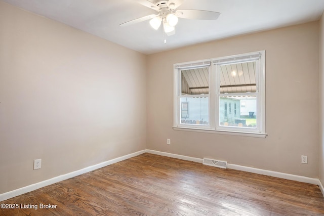 1833 Farnsley Rd, Louisville, KY 40216 - empty room featuring ceiling fan and wood finished floors