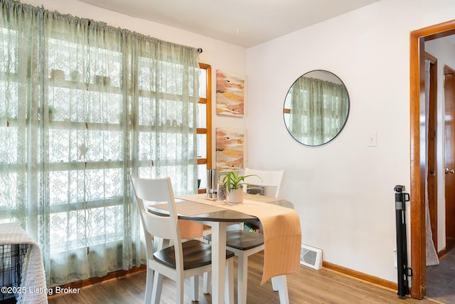 1833 Farnsley Rd, Louisville, KY 40216 - dining area with wood finished floors and baseboards