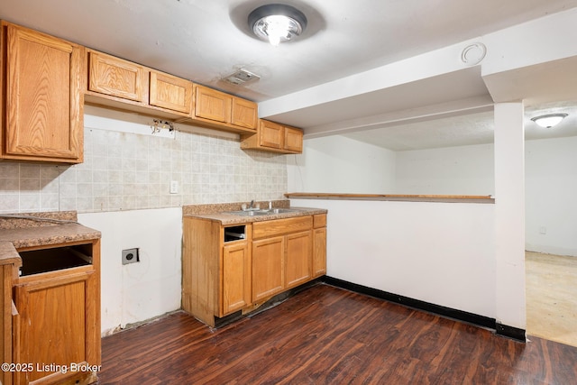1833 Farnsley Rd, Louisville, KY 40216 - kitchen featuring tasteful backsplash, dark wood finished floors, and light countertops