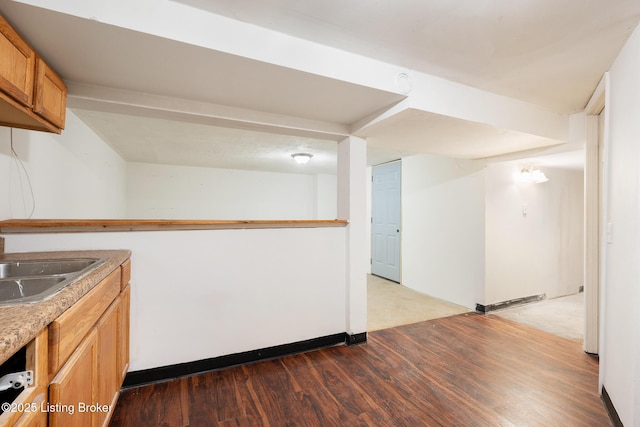 1833 Farnsley Rd, Louisville, KY 40216 - kitchen with wood finished floors, brown cabinets, and light countertops