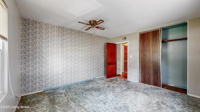 116 E Southern Heights Ave, Louisville, KY 40214 - unfurnished bedroom featuring a closet, carpet, and ceiling fan