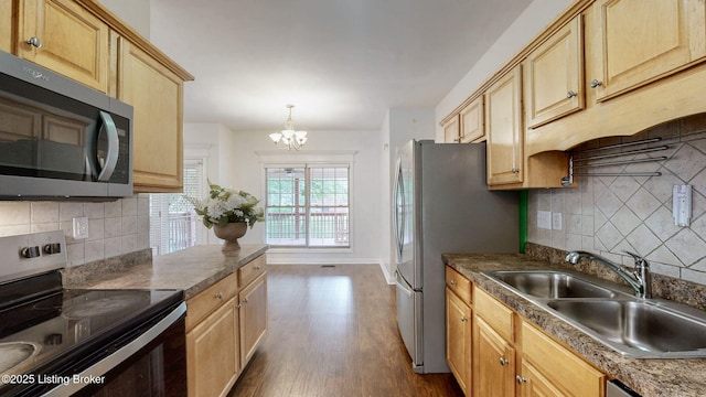 4301 Juniper Forest Pl, Louisville, KY 40245 - kitchen featuring stainless steel appliances, light brown cabinets, and dark wood finished floors