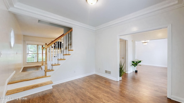 4301 Juniper Forest Pl, Louisville, KY 40245 - staircase with wood finished floors, ornamental molding, and a chandelier
