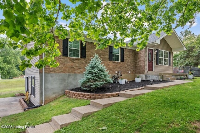 1376 Darlene Ct, Radcliff, KY 40160 - view of front facade featuring a front yard and brick siding