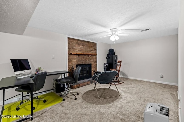1376 Darlene Ct, Radcliff, KY 40160 - carpeted home office featuring a ceiling fan, a textured ceiling, and a fireplace