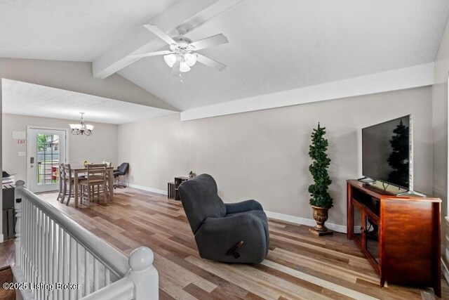 1376 Darlene Ct, Radcliff, KY 40160 - living area featuring wood finished floors, a chandelier, and ceiling fan
