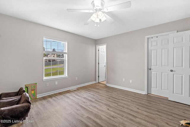 1376 Darlene Ct, Radcliff, KY 40160 - unfurnished room with wood finished floors and ceiling fan