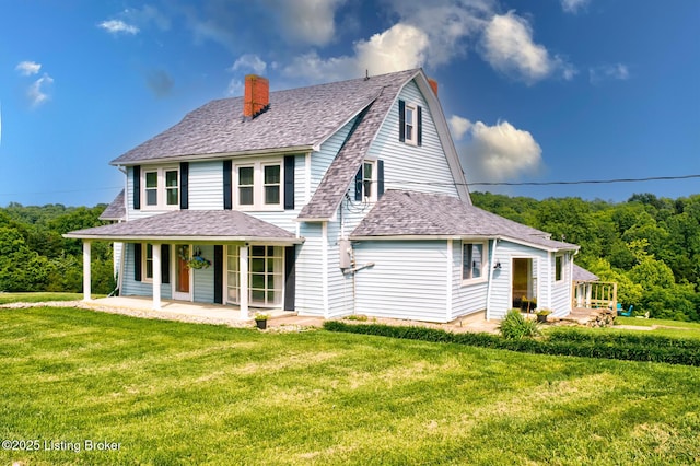 3591 Bardstown Rd, Lawrenceburg, KY 40342 - view of front of home with a chimney, a front lawn, and roof with shingles