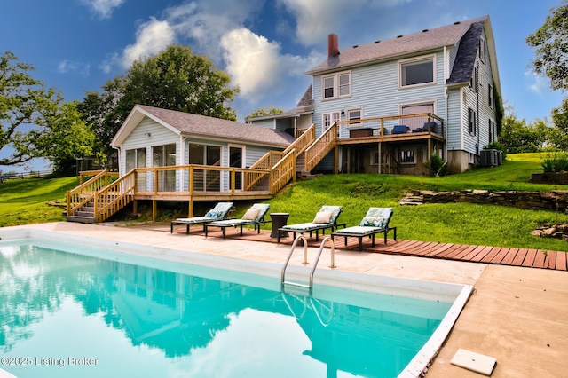 3591 Bardstown Rd, Lawrenceburg, KY 40342 - back of house featuring stairs, a deck, a sunroom, and an outdoor pool