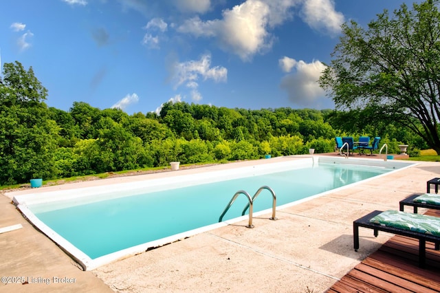 3591 Bardstown Rd, Lawrenceburg, KY 40342 - outdoor pool with a patio and a view of trees