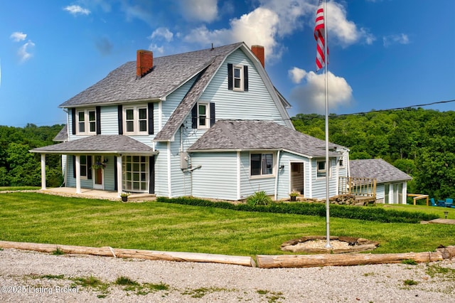 3591 Bardstown Rd, Lawrenceburg, KY 40342 - view of front of property with a chimney, a front lawn, and a porch
