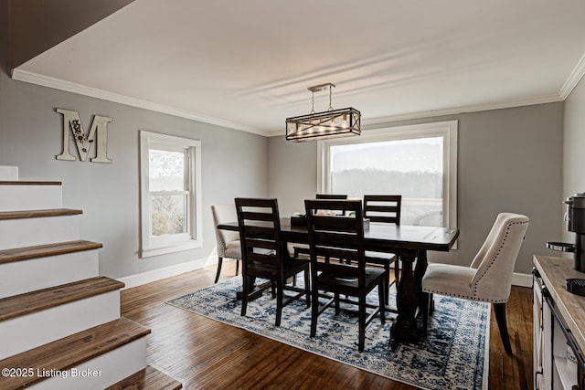 3591 Bardstown Rd, Lawrenceburg, KY 40342 - dining area with ornamental molding, dark wood-style floors, and stairway