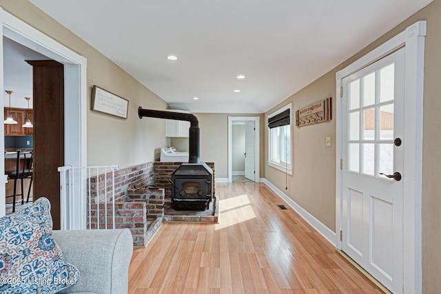 3591 Bardstown Rd, Lawrenceburg, KY 40342 - living area with a wood stove, light wood finished floors, and recessed lighting