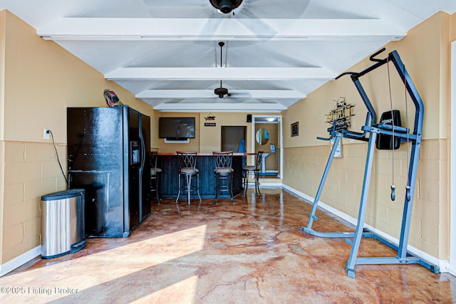 3591 Bardstown Rd, Lawrenceburg, KY 40342 - workout room with ceiling fan, concrete block wall, vaulted ceiling, and a bar