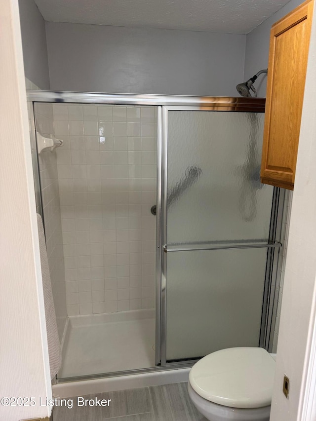 7073 Glen Kerry Ct, Florence, KY 41042 - bathroom with a stall shower and toilet