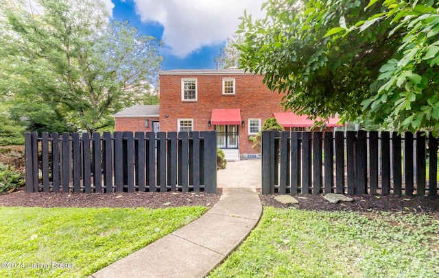 8613 Whipps Bend Rd, Bellemeade, KY 40222 - view of front of property with brick siding and a fenced front yard