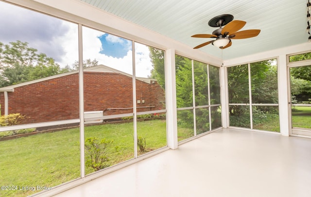 8613 Whipps Bend Rd, Bellemeade, KY 40222 - unfurnished sunroom with a ceiling fan and plenty of natural light