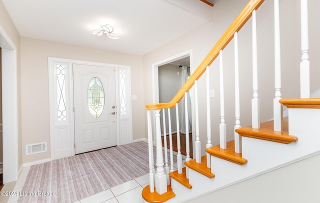 8613 Whipps Bend Rd, Bellemeade, KY 40222 - carpeted entrance foyer featuring stairway and tile patterned flooring