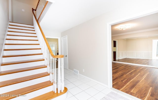8613 Whipps Bend Rd, Bellemeade, KY 40222 - stairs featuring crown molding and wood finished floors