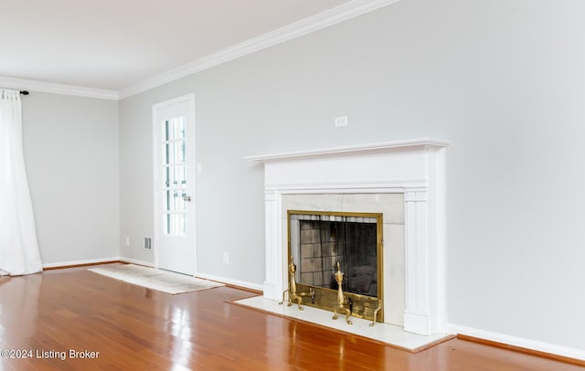 8613 Whipps Bend Rd, Bellemeade, KY 40222 - unfurnished living room with wood finished floors, ornamental molding, and a tiled fireplace