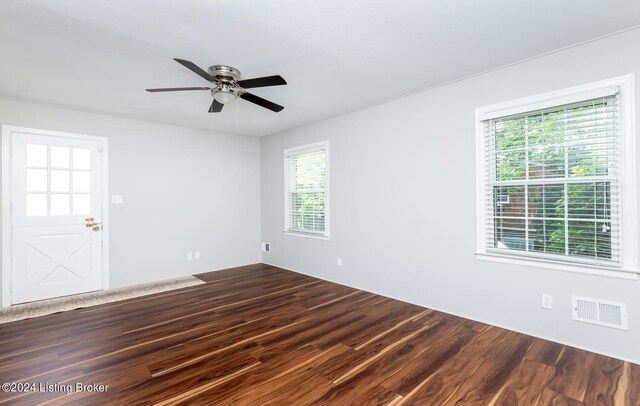 8613 Whipps Bend Rd, Bellemeade, KY 40222 - spare room featuring a ceiling fan and dark wood-type flooring