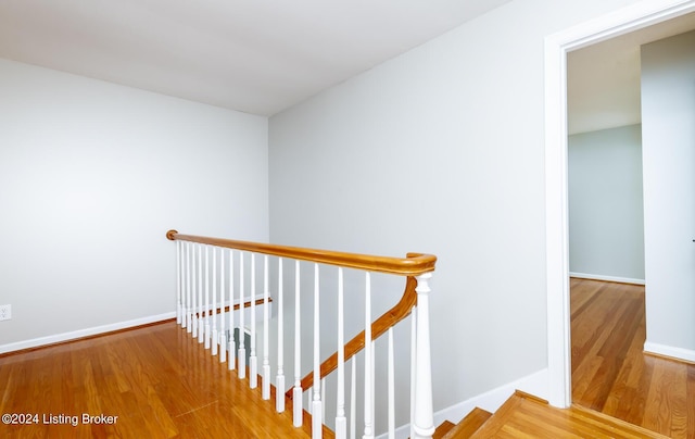 8613 Whipps Bend Rd, Bellemeade, KY 40222 - staircase featuring wood finished floors and baseboards