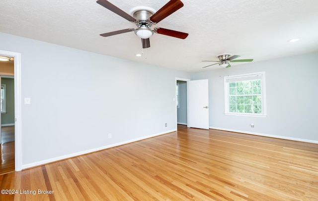 8613 Whipps Bend Rd, Bellemeade, KY 40222 - spare room featuring light wood-style flooring, ceiling fan, and recessed lighting