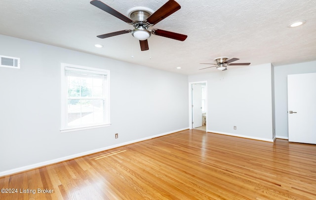 8613 Whipps Bend Rd, Bellemeade, KY 40222 - spare room featuring recessed lighting, a ceiling fan, light wood-type flooring, and a textured ceiling