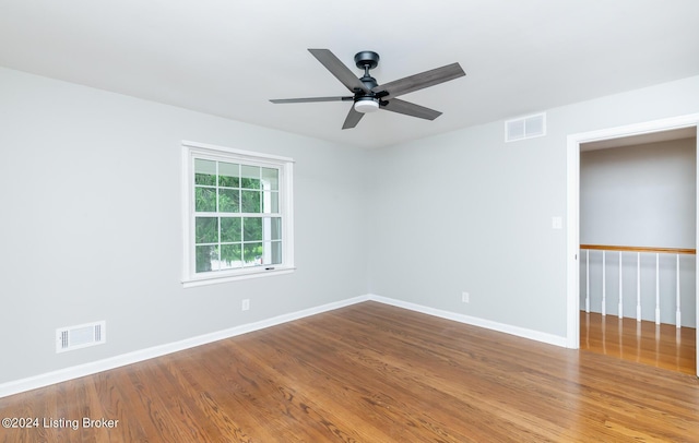 8613 Whipps Bend Rd, Bellemeade, KY 40222 - empty room with wood finished floors and a ceiling fan
