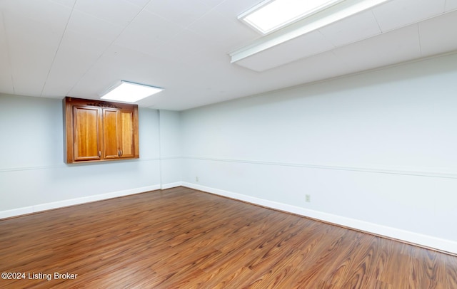 8613 Whipps Bend Rd, Bellemeade, KY 40222 - spare room with dark wood-type flooring and baseboards