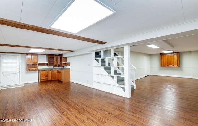 8613 Whipps Bend Rd, Bellemeade, KY 40222 - unfurnished living room with dark wood-type flooring, stairs, and beam ceiling
