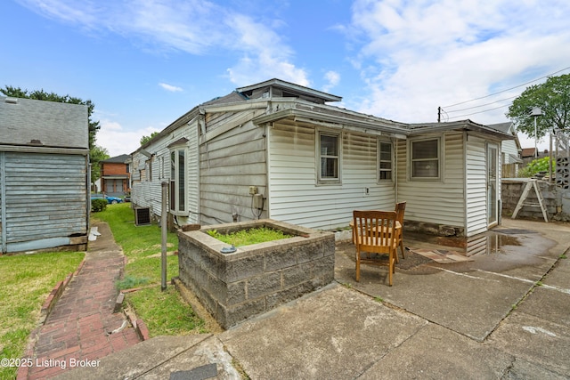 1736 W Gaulbert Ave, Louisville, KY 40210 - back of house featuring a patio area
